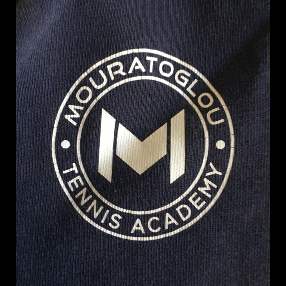 Mouratoglou Tennis Academy’s blue pullover hoodie